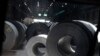 FILE - In this June 28, 2018, file photo, rolls of finished steel are seen at the U.S. Steel Granite City Works facility in Granite City, Ill.