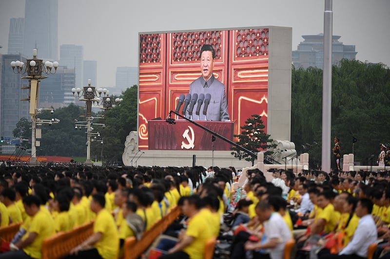 Chinese President Xi Jinping, on screen, delivers a speech during the celebrations of the 100th anniversary of the founding of the Communist Party of China at Tiananmen Square in Beijing on July 1, 2021.