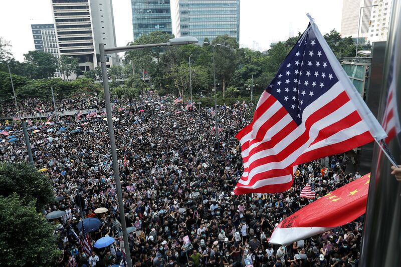 Protesters march to call for the passing of the Hong Kong Human Rights and Democracy Act by the U.S. Congress, in Hong Kong, Sept. 8, 2019.