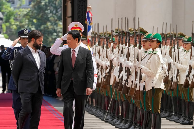 Chilean President Gabriel Boric, left, welcomes Vietnam\'s President Luong Cuong to La Moneda presidential palace in Santiago, Chile, Monday, Nov. 11, 2024.