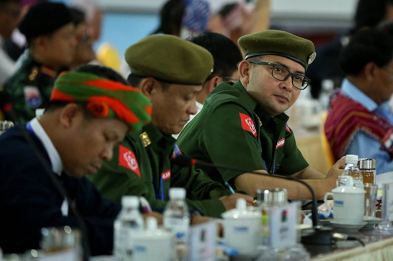 Arakan Army leaders gather with other rebel leaders and representatives at a conference in Mai Ja Yang in Myanmar’s northern Kachin state on July 26, 2016.