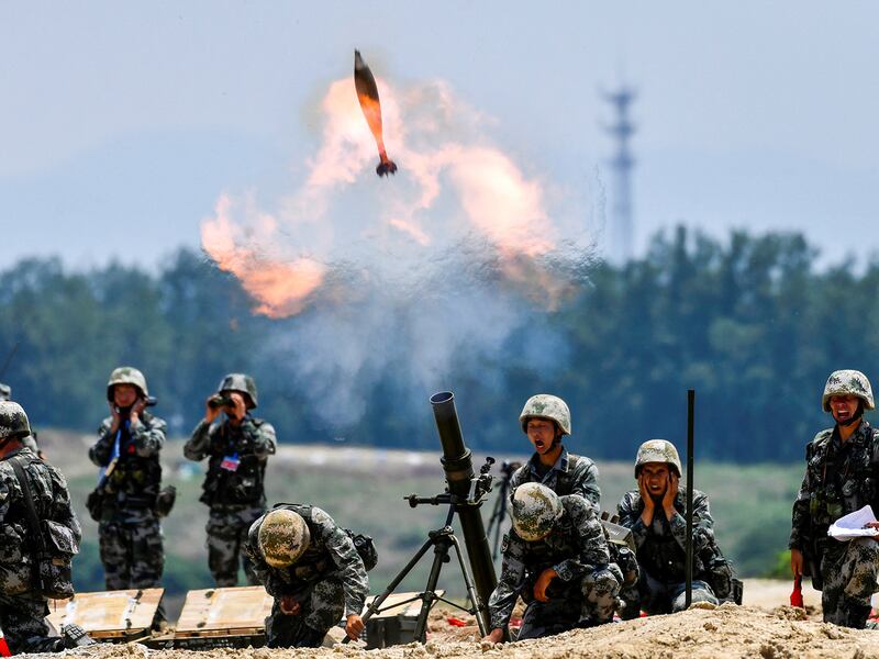 Soldiers of Chinese People\'s Liberation Army fire a mortar during a live-fire military exercise in Anhui province, China May 22, 2021. (Reuters)